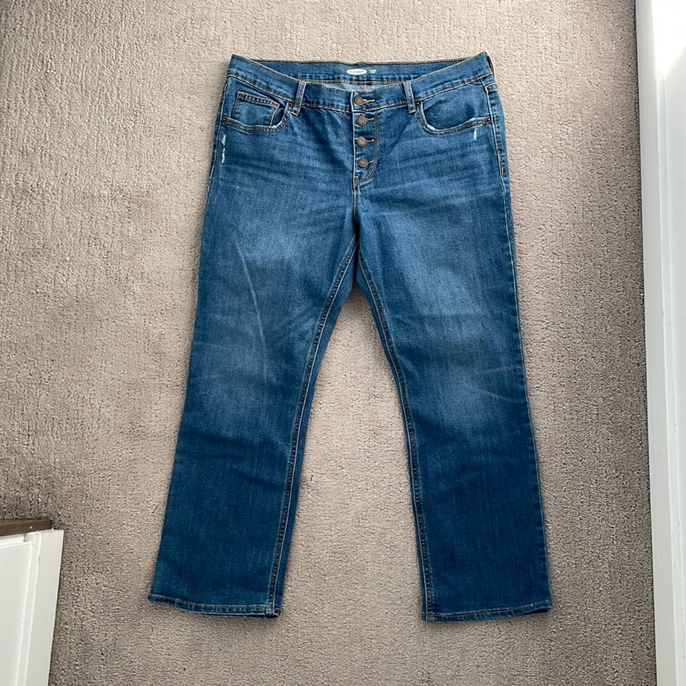 Cropped ankle flare button front jeans